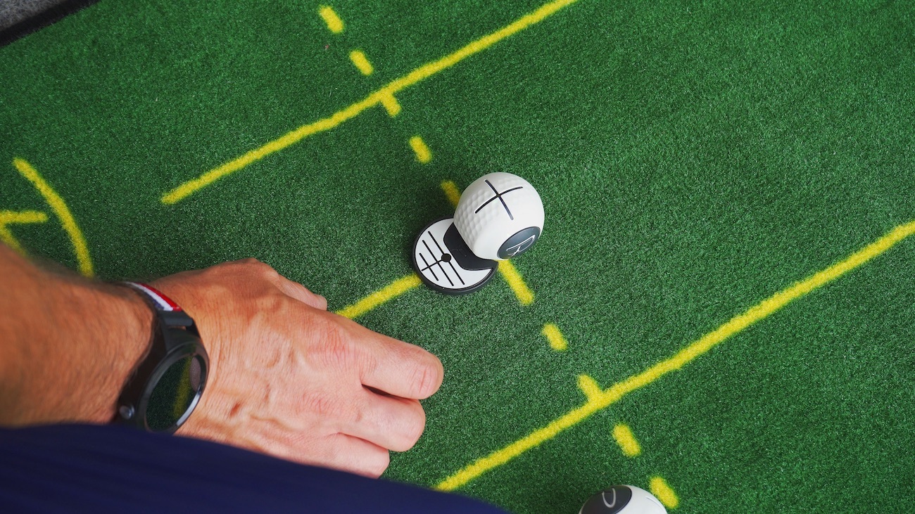 Devil Ball Marker On Mat W Hand