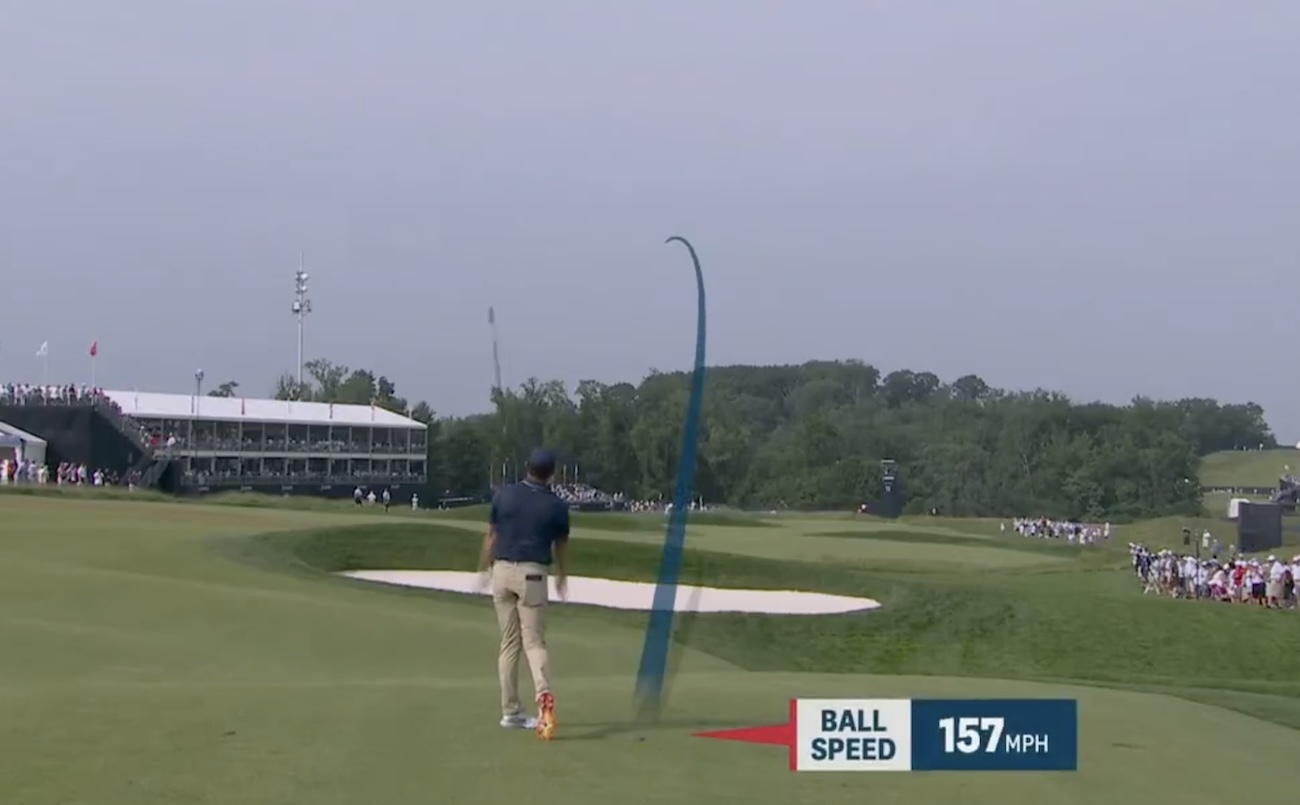 Rory McIlroy throws club
